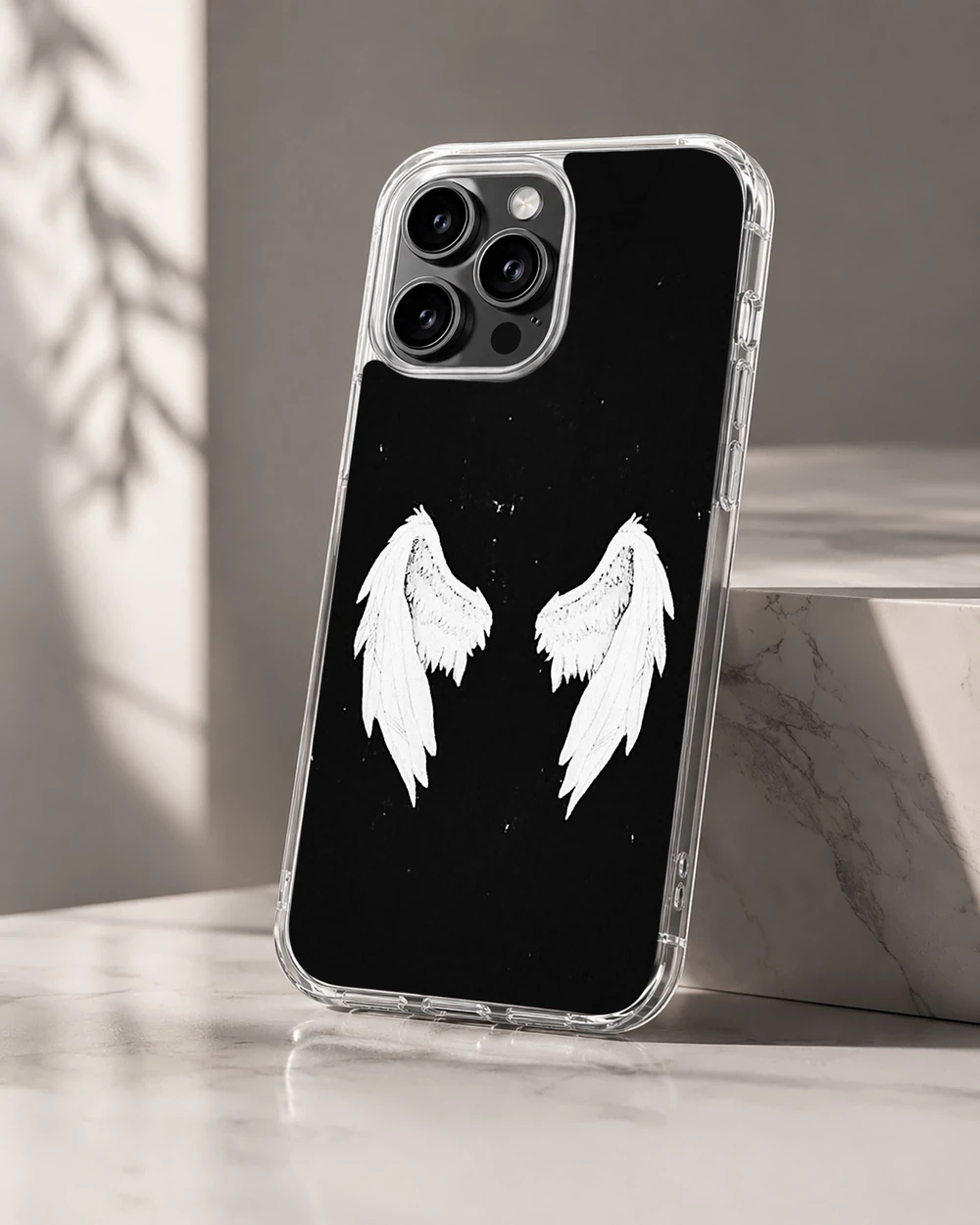 Angel phone cover design with wings on a black background